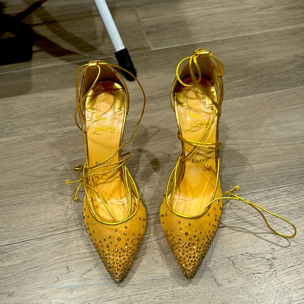 Christian Louboutin tie up pumps!